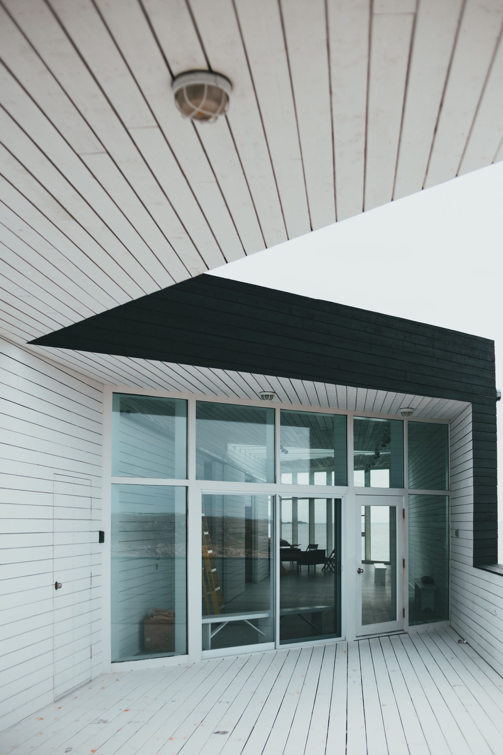 Elegant modern architectural design showcasing a glass facade entrance.